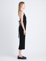 Side image of model wearing Vida Dress In Viscose Rib in BLACK