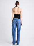 Back image of model in Ellsworth Jean in medium blue