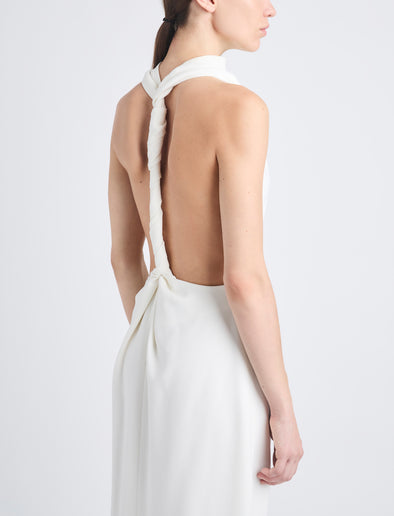 Detail image of model wearing Selena Twist Back Dress in Matte Viscose Crepe in white