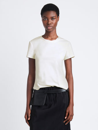 Cropped front image of model wearing Maren Top in Eco Cotton Jersey in bone
