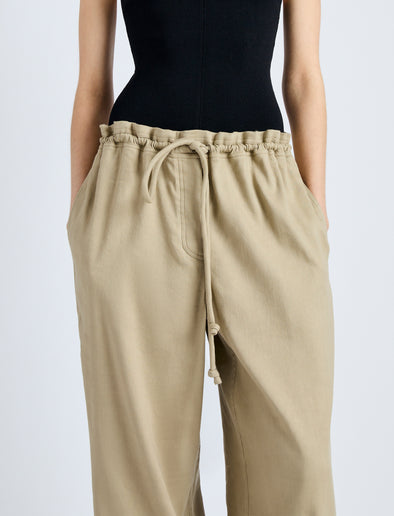 Detail image of model wearing Jade Pant in Eco Stretch Linen Viscose in BRONZE