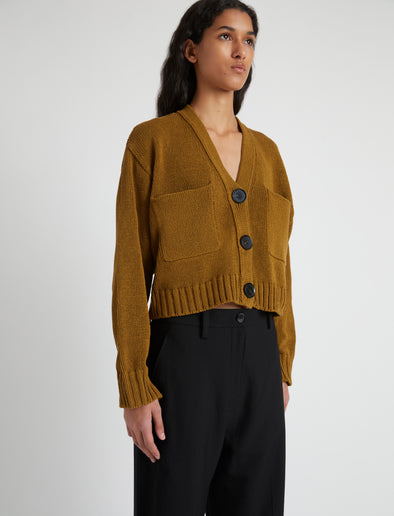 Detail image of model wearing Sofia Cardigan In Cotton in OCHRE