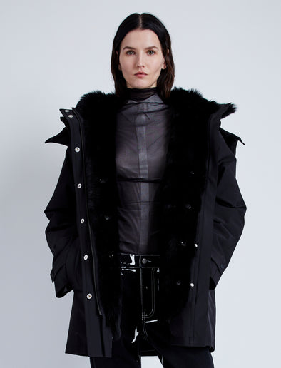 Front cropped image of model wearing Wilder Coat In Technical Nylon in Black