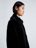 Detail image of model wearing Fiona Coat In Sheared Toscana in Black