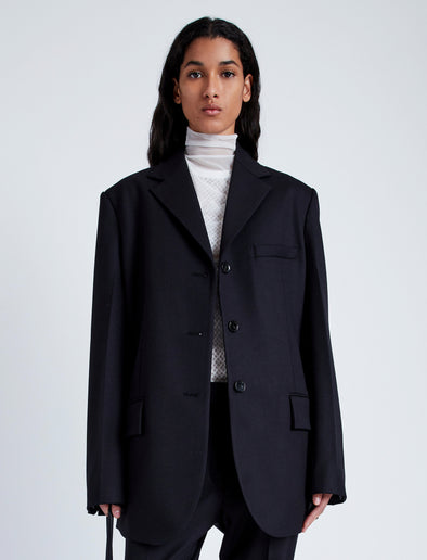 Proenza Schouler Front cropped image of model wearing Archer Jacket in Wool Twill Suiting in BLACK
