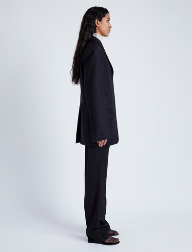 Proenza Schouler Side full length image of model wearing Archer Jacket in Wool Twill Suiting in BLACK