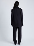 Back full length image of model wearing Archer Jacket In Wool Twill in Black