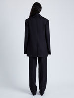 Back full length image of model wearing Archer Jacket In Wool Twill in Black