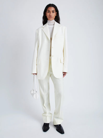 Proenza Schouler Front full length image of model wearing Archer Jacket in Wool Twill Suiting in WAX
