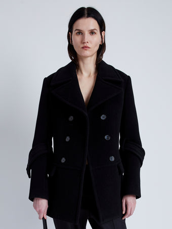Front cropped image of model wearing Rowen Peacoat In Eco Double Face Wool in Black