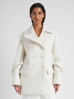 Cropped front image of model wearing Rowen Coat in Eco Double Face Wool in ecru
