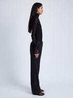 Side full length image of model wearing Rio Top In Tulle Jersey in Black