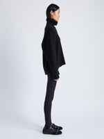 Side full length image of model wearing Stiltsman Stirrup In Compact Jersey in Black