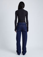 Back full length image of model wearing Alyssa Sweater In Wool Viscose Knit in Charcoal