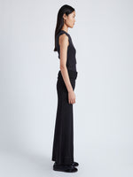 Side image of model wearing Avalon Skirt In Lacquered Knit in Black