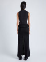 Back full length image of model wearing Avalon Skirt In Lacquered Knit in Black