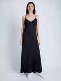 Front image of model wearing Bella Dress in Lacquered Viscose in black