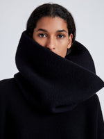 Detail image of model wearing Tube Scarf In Cashmere Knit in Black