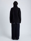 Back full length image of model wearing Yara Sweater In Double Face Cashmere in Black