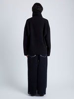 Back full length image of model wearing Yara Sweater In Double Face Cashmere in Black