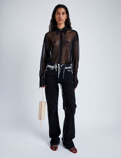 Front image of model wearing Ryman Jean in black multi