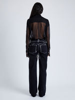 Back image of model wearing Ryman Jean in black multi