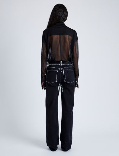 Back image of model wearing Ryman Jean in black multi