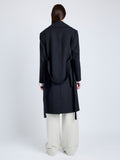 Proenza Schouler Back full length image of model wearing Thea Coat in Wool Gabardine Suiting in BLACK