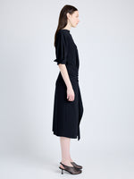 Proenza Schouler Side full length image of model wearing Maisie Dress in Matte Viscose Crepe in BLACK