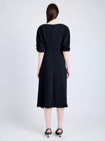 Proenza Schouler Back full length image of model wearing Maisie Dress in Matte Viscose Crepe in BLACK