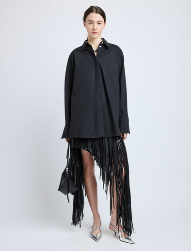 Proenza Schouler Front full length image of model wearing Phia Skirt in Leather Silk Fringe in Black