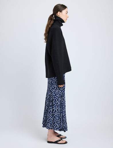 Proenza Schouler Side full length image of model wearing Joelle Skirt in Printed Silk Viscose in Navy Multi