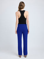 Proenza Schouler back image of model wearing Alexia Pant in Bi-Stretch Suiting in cobalt