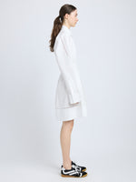Proenza Schouler Side full length image of model wearing Sammy Dress in Eco Cotton Poplin in White