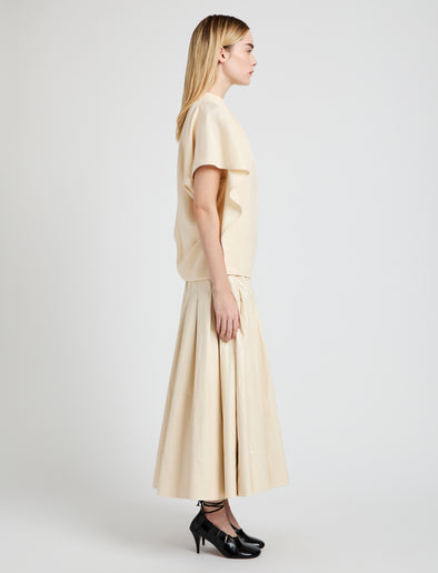 Proenza Schouler Side full length image of model wearing Etta Top in Hammered Viscose in Champagne