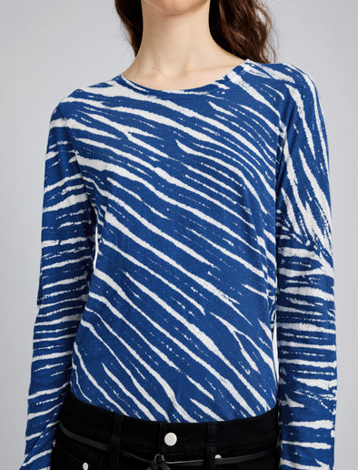 Proenza Schouler Detail image of model wearing Mia T-Shirt in Tie Dye Tissue Jersey in Blue Multi