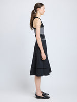 Proenza Schouler Side full length image of model wearing Laci Skirt in Eco Cotton Poplin in Black