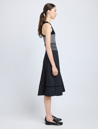Proenza Schouler Side full length image of model wearing Laci Skirt in Eco Cotton Poplin in Black