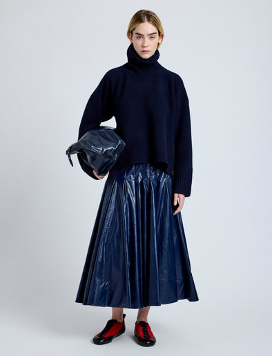 Proenza Schouler Front full length image of model wearing Petra Skirt in Lacquered Cotton in Navy