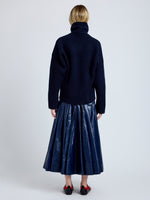 Proenza Schouler Back full length image of model wearing Petra Skirt in Lacquered Cotton in Navy