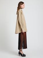 Proenza Schouler Side full length image of model wearing Veda Skirt in Faux Leather Fringe in Brown Multi