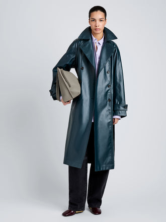 Proenza Schouler Front full length image of model wearing Benedetta Trench Coat in Coated Cotton in Bottle Green