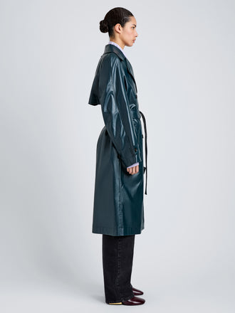 Proenza Schouler Side full length image of model wearing Benedetta Trench Coat in Coated Cotton in Bottle Green