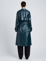 Proenza Schouler Back full length image of model wearing Benedetta Trench Coat in Coated Cotton in Bottle Green