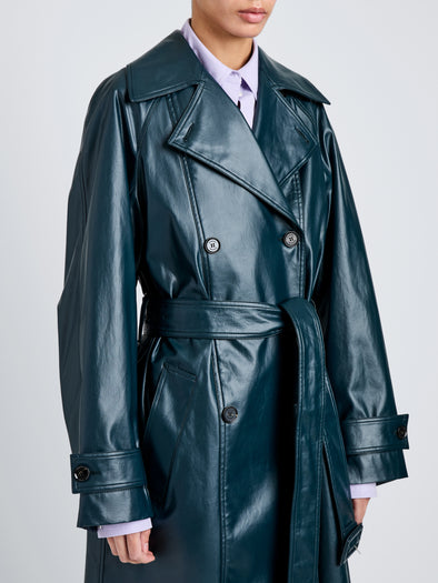 Proenza Schouler Detail image of model wearing Benedetta Trench Coat in Coated Cotton in Bottle Green