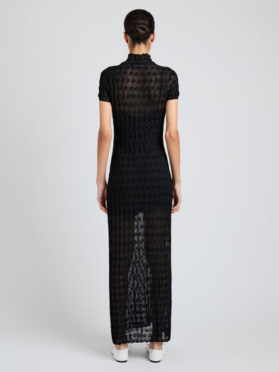 Proenza Schouler Back full length image of model wearing Zein Dress in Geo Textured Knit in Black