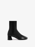 Proenza Schouler side image of Glove Ankle Boots in Slick Nappa in black