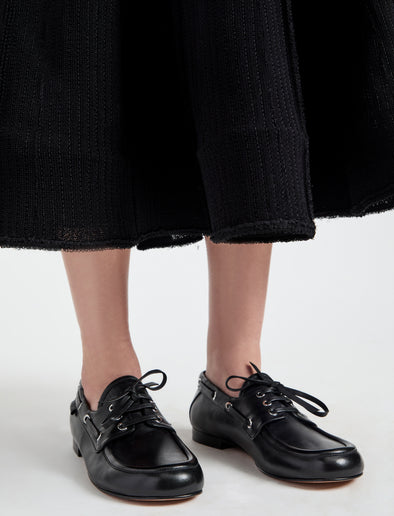 Image of model wearing Deck Shoes in Nappa in Black