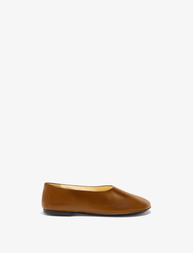 Front image of Glove Slippers in Slick Nappa in Mud