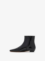 3/4 Back image of Trap Flat Ankle Boots In Nappa Leather in Black
